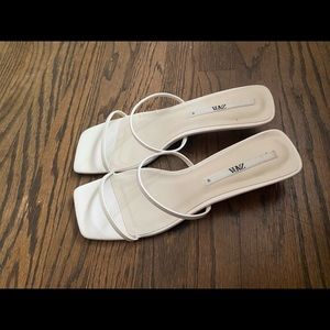 White kitten heeled leather sandals